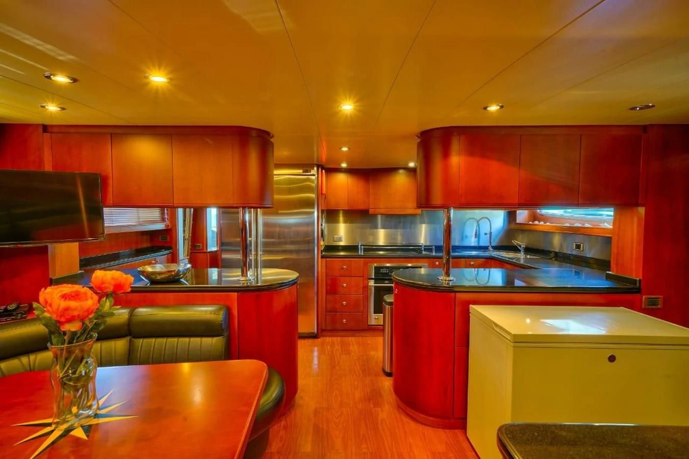 a kitchen with a large island aboard DANIELA Yacht for Sale