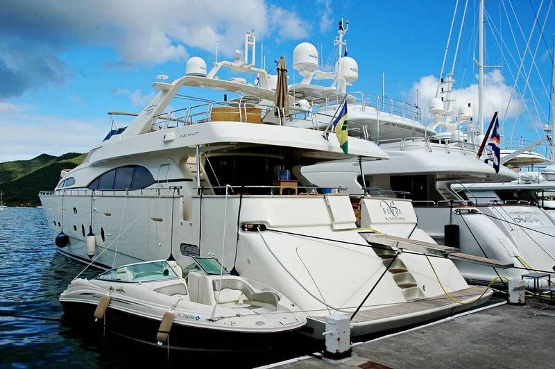 a boat docked at a pier aboard DANIELA Yacht for Sale