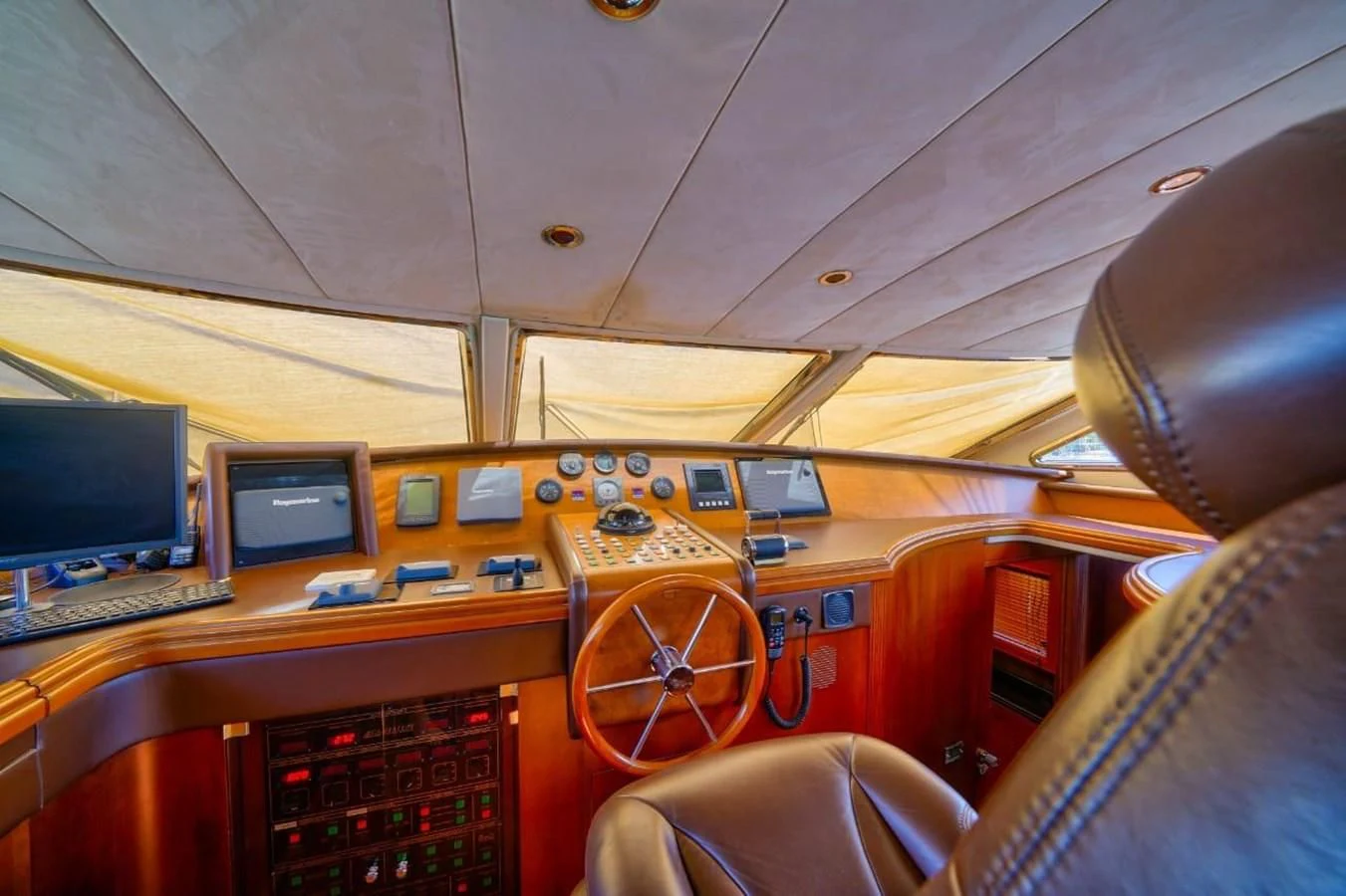 a plane with a desk and computer aboard DANIELA Yacht for Sale
