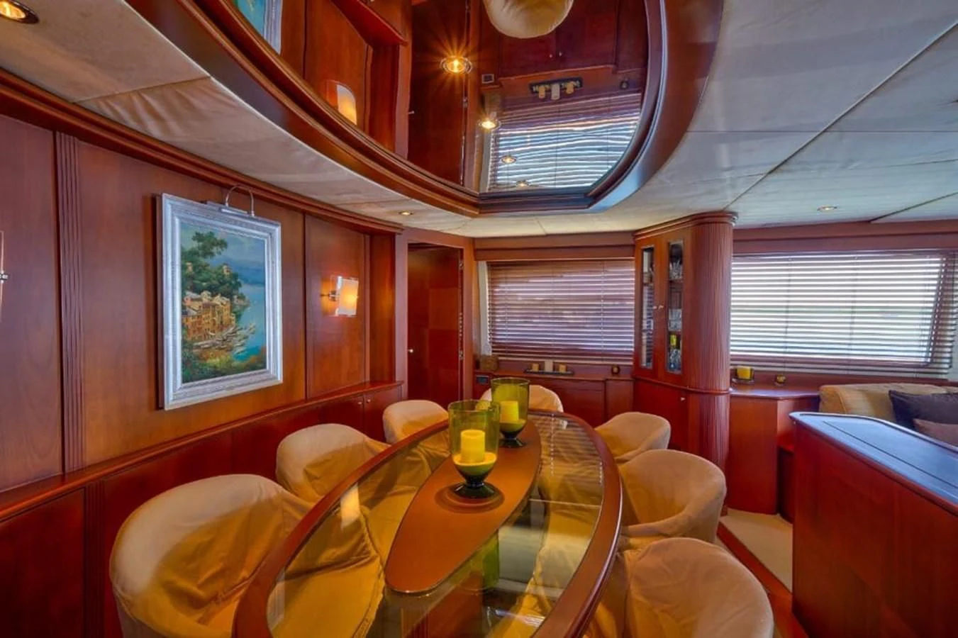 a room with a table and chairs aboard DANIELA Yacht for Sale