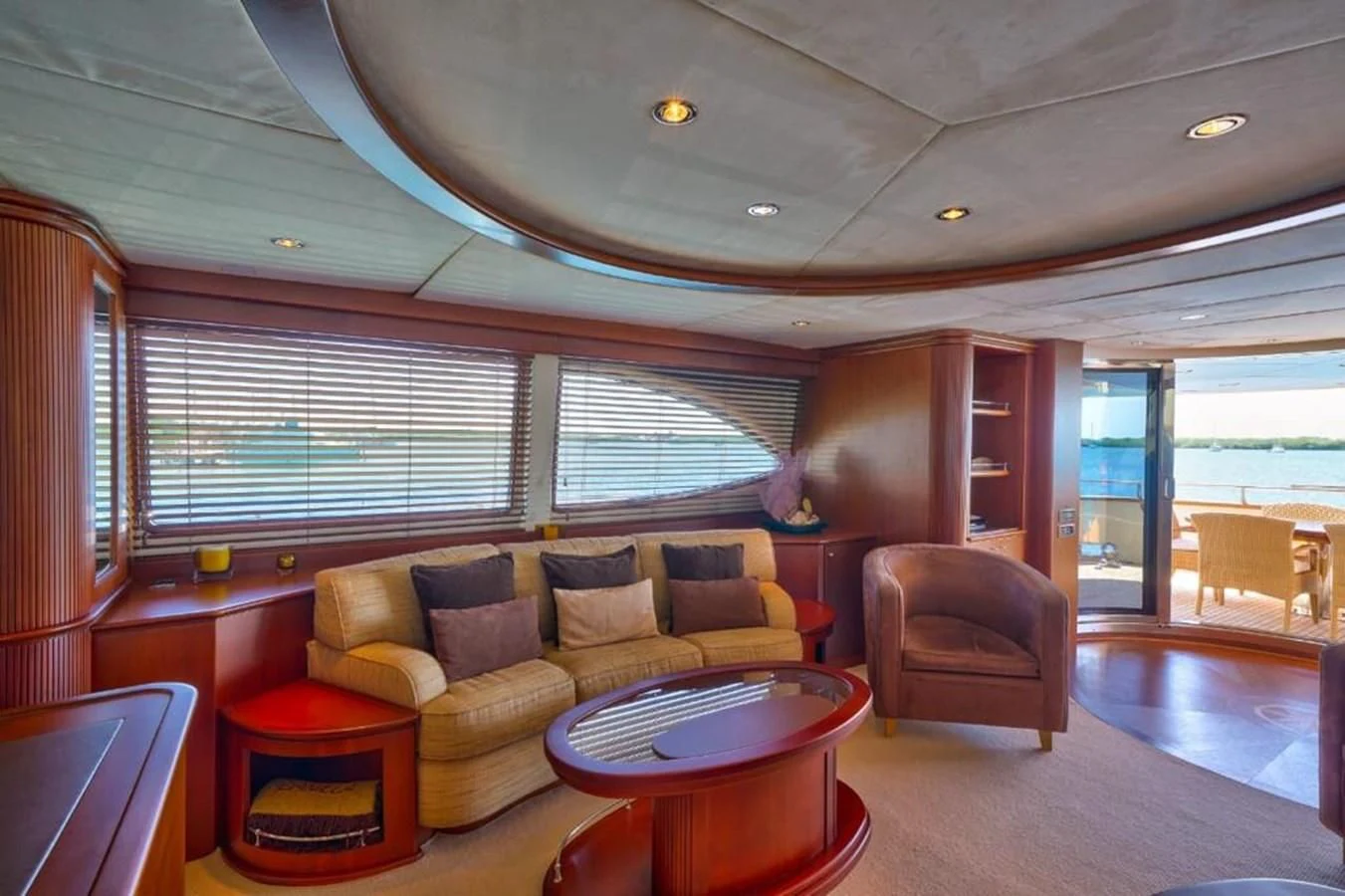 a living room with a couch and a table aboard DANIELA Yacht for Sale