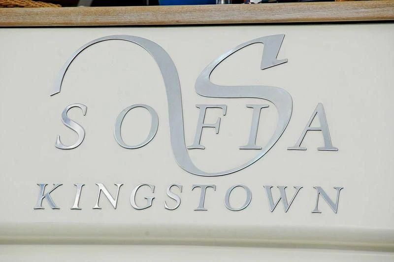 a white sign with black text aboard DANIELA Yacht for Sale