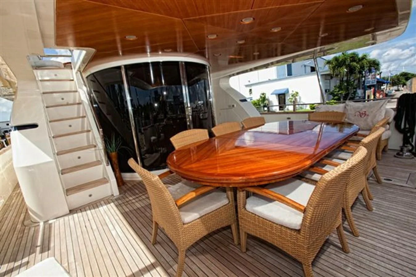 a table and chairs in a room aboard DANIELA Yacht for Sale