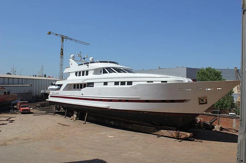 a boat on a dock aboard LIMITLESS Yacht for Sale