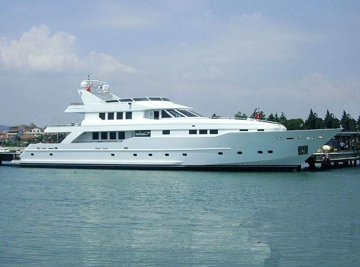 a large white yacht in the water aboard LIMITLESS Yacht for Sale