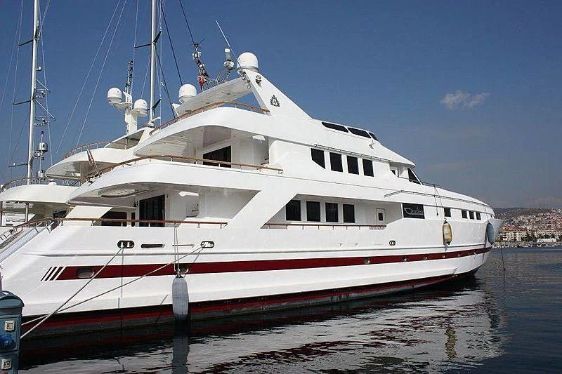 a large white boat aboard LIMITLESS Yacht for Sale