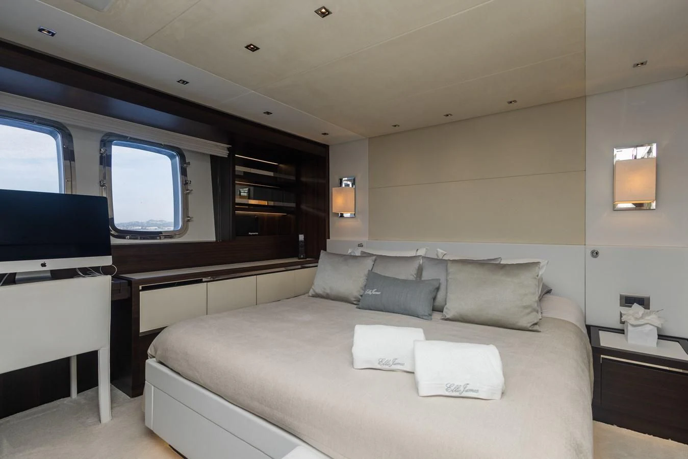 a room with a bed and a desk aboard ELLIE JAMES Yacht for Sale