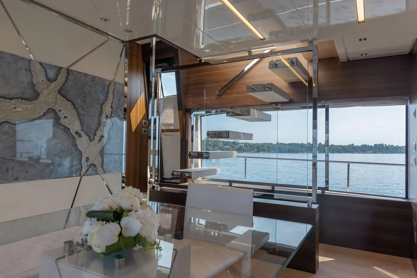 a room with a table and chairs aboard ELLIE JAMES Yacht for Sale