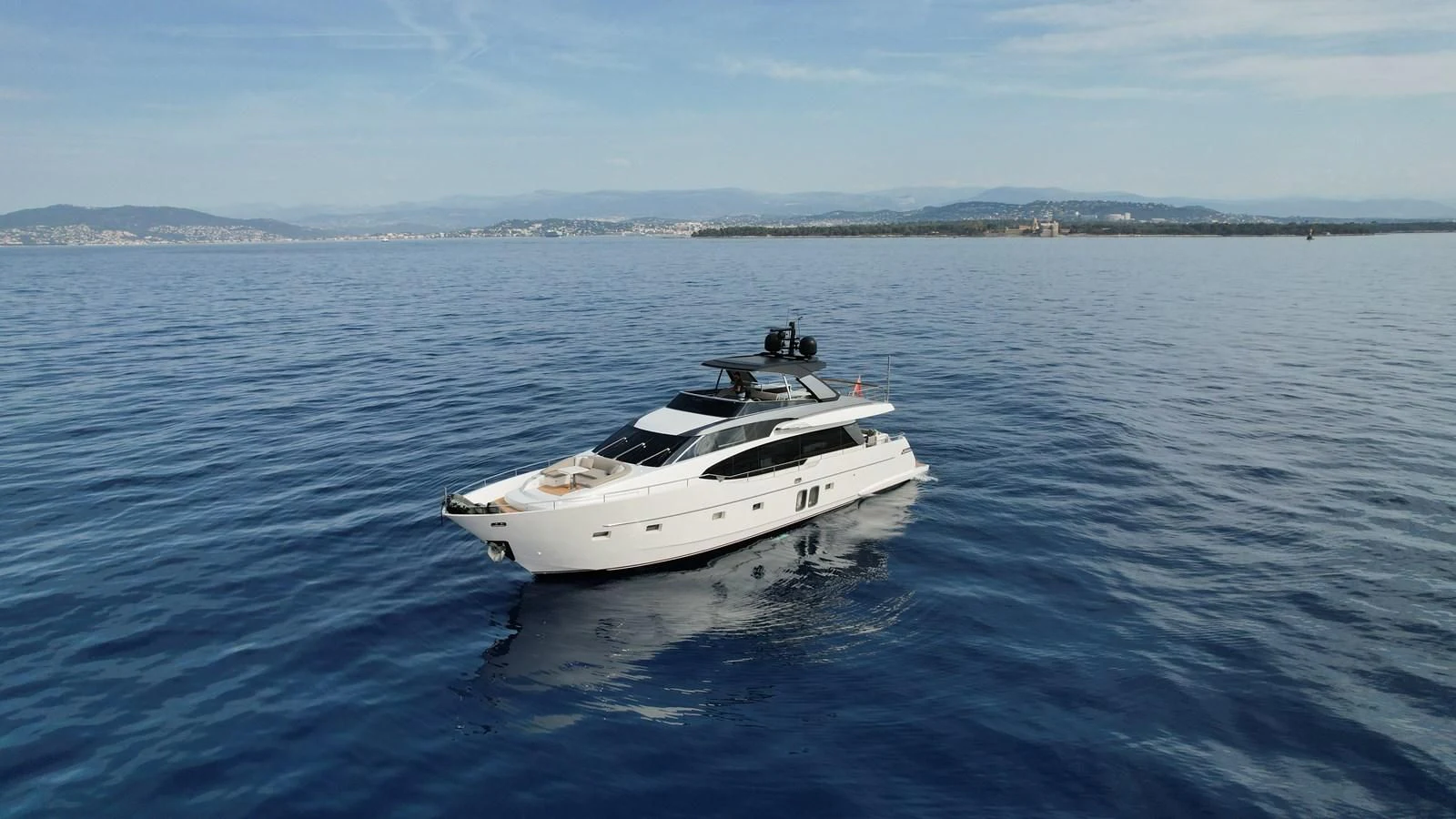 a white yacht on the water aboard ELLIE JAMES Yacht for Sale