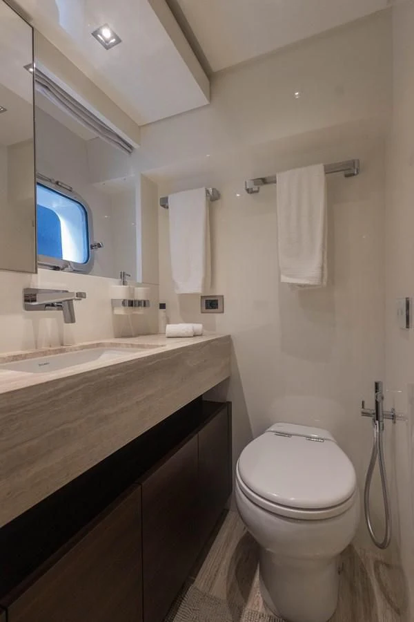 a bathroom with a toilet and a sink aboard ELLIE JAMES Yacht for Sale