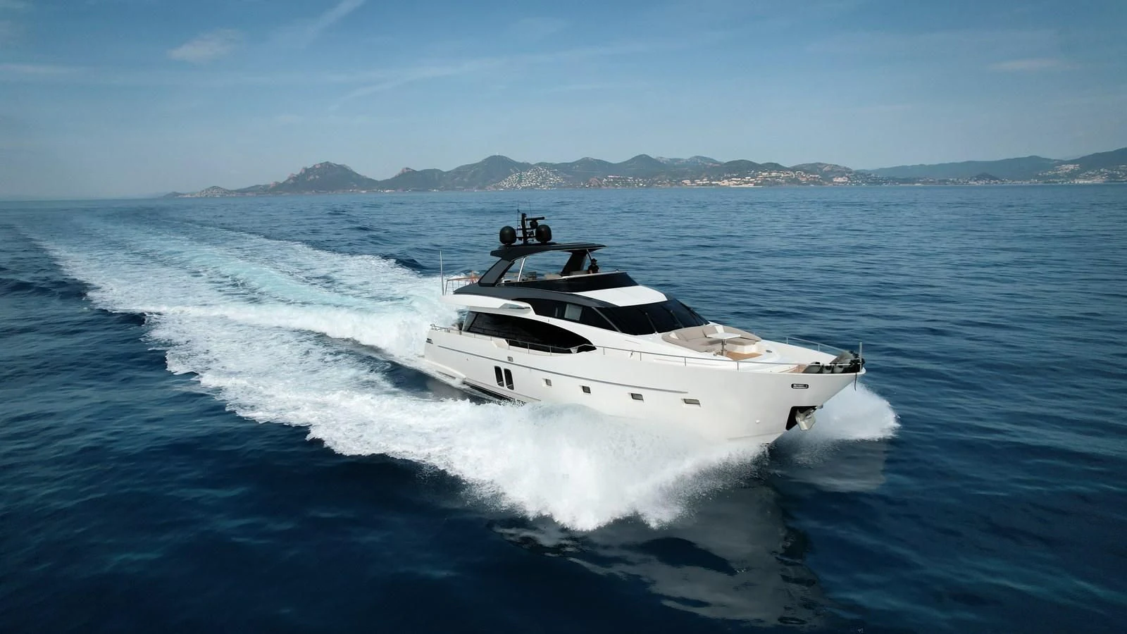 a white yacht on water aboard ELLIE JAMES Yacht for Sale