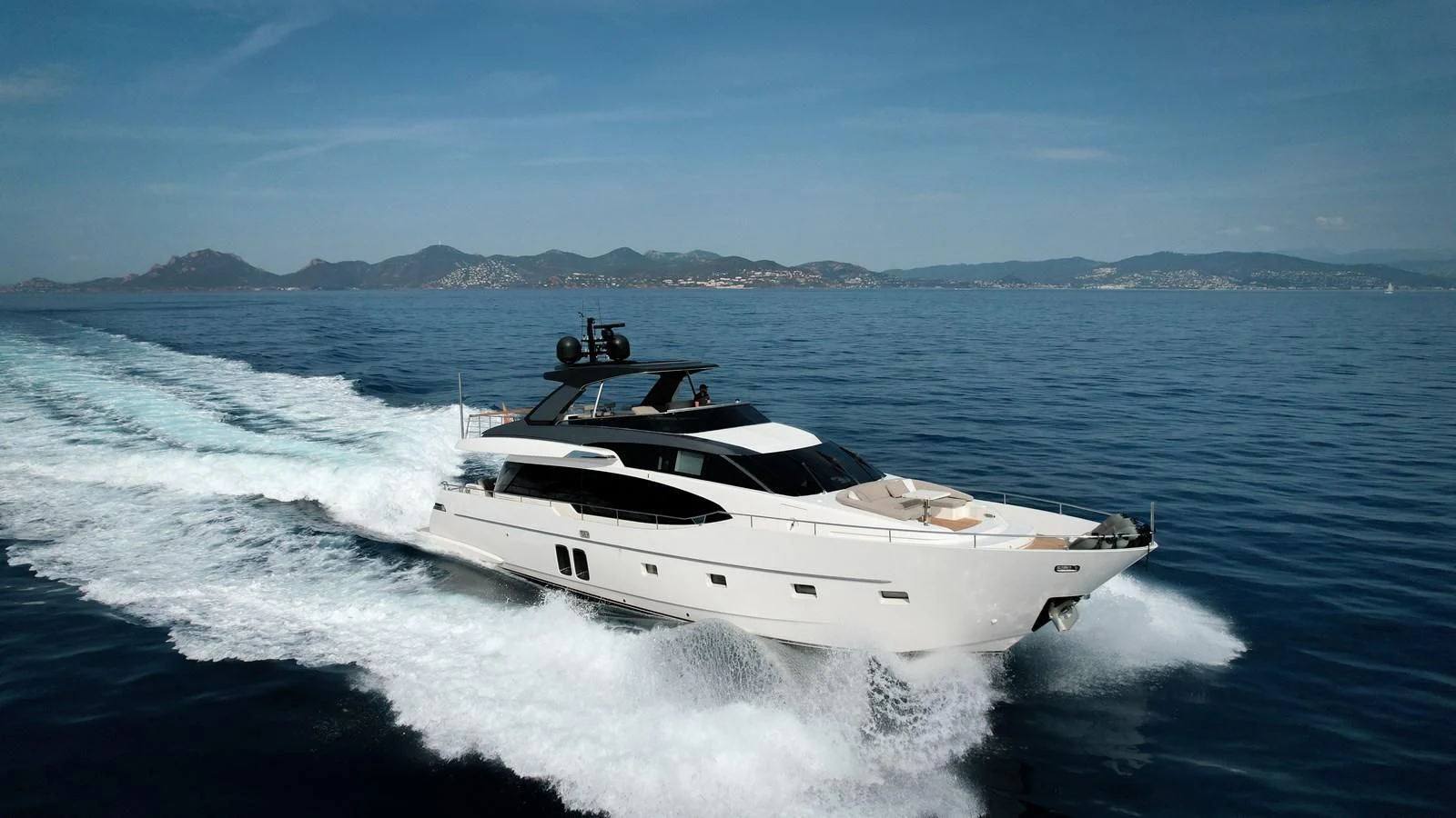 a white yacht on the water aboard ELLIE JAMES Yacht for Sale