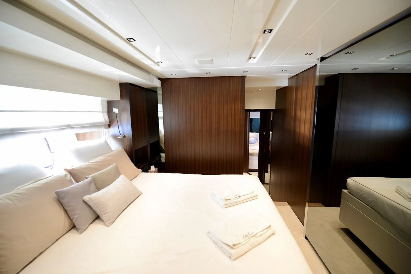 a room with a bed and a desk aboard ELLIE JAMES Yacht for Sale