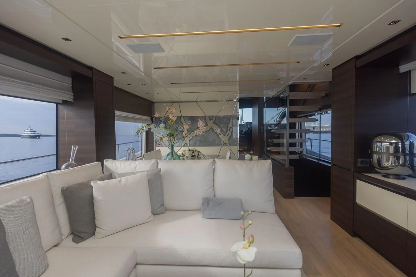 a living room with a large window aboard ELLIE JAMES Yacht for Sale