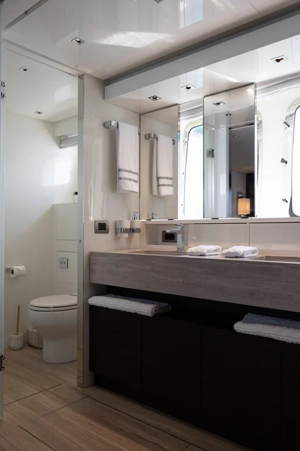 a bathroom with a large mirror aboard ELLIE JAMES Yacht for Sale