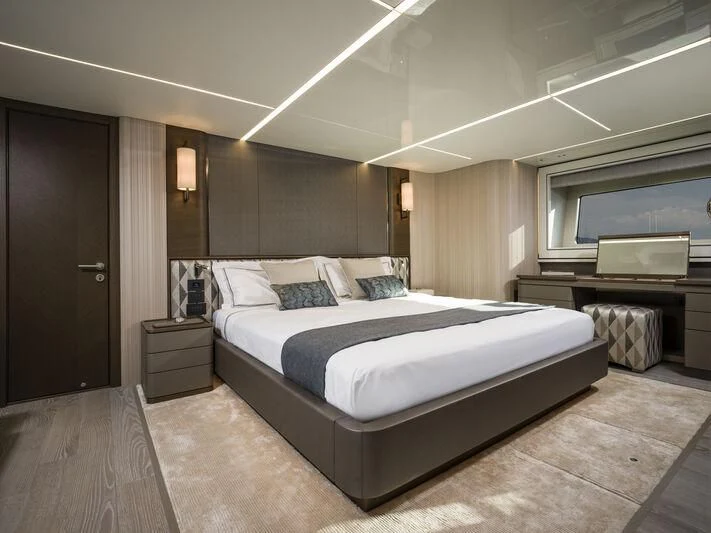 a large bedroom with a bed aboard BANDAZUL Yacht for Sale
