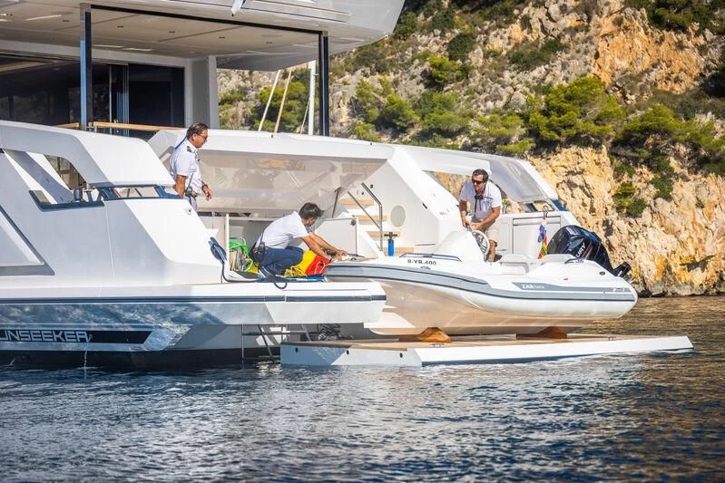 a group of men on a boat aboard BANDAZUL Yacht for Sale