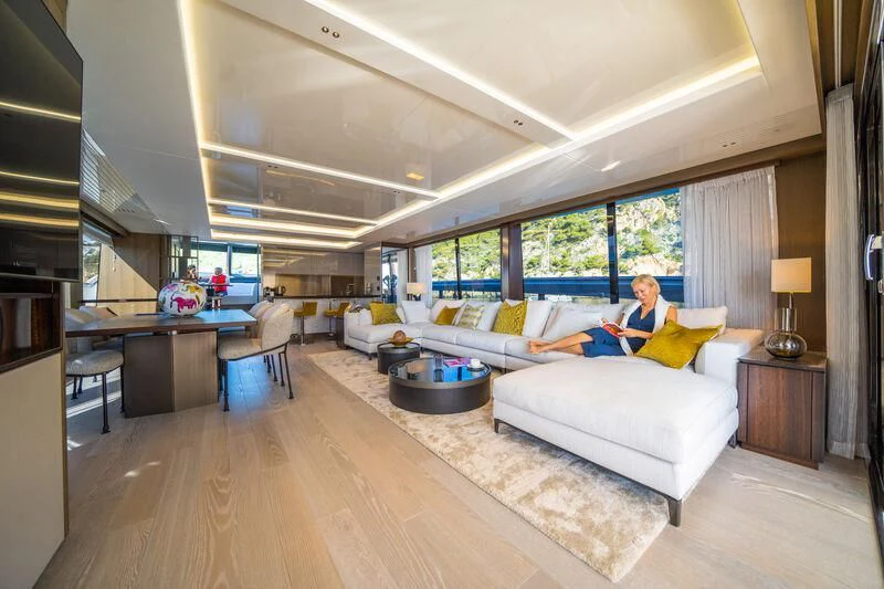 a person sitting on a couch aboard BANDAZUL Yacht for Sale