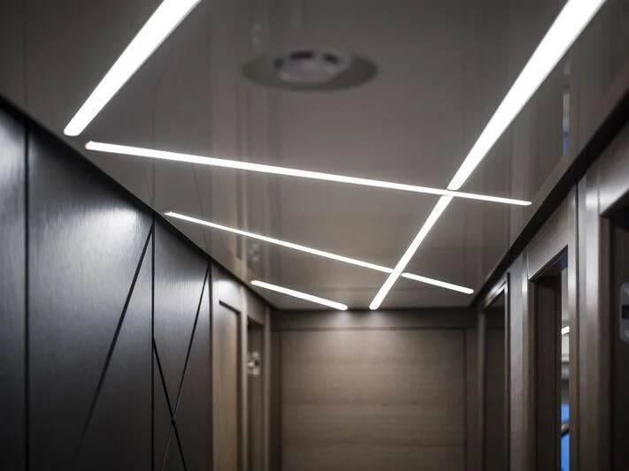a ceiling fan in a room aboard BANDAZUL Yacht for Sale