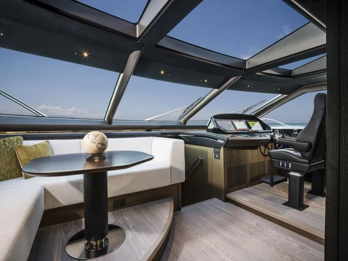 a table and chairs on a boat aboard BANDAZUL Yacht for Sale