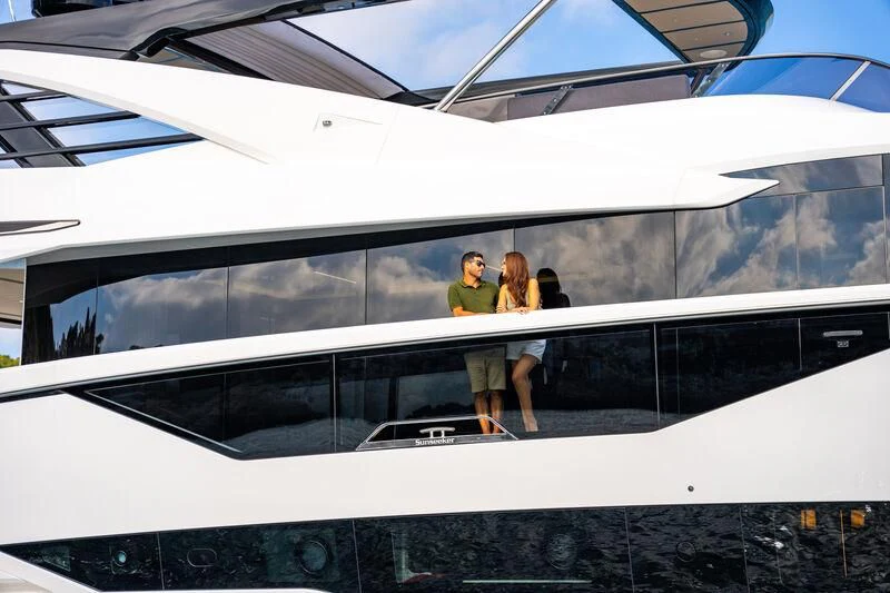 a group of people standing on a train aboard BANDAZUL Yacht for Sale