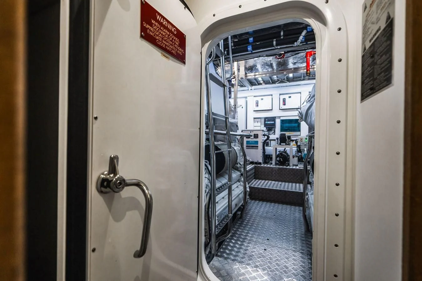 a door open to a hallway aboard SEA-ZAR Yacht for Sale