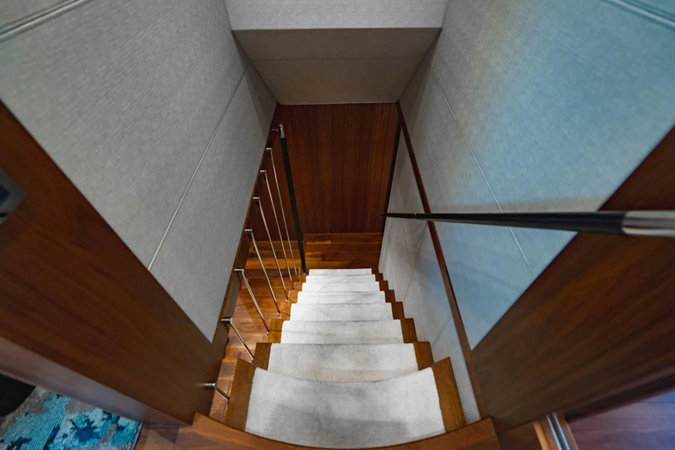 a staircase with a railing aboard SEA-ZAR Yacht for Sale