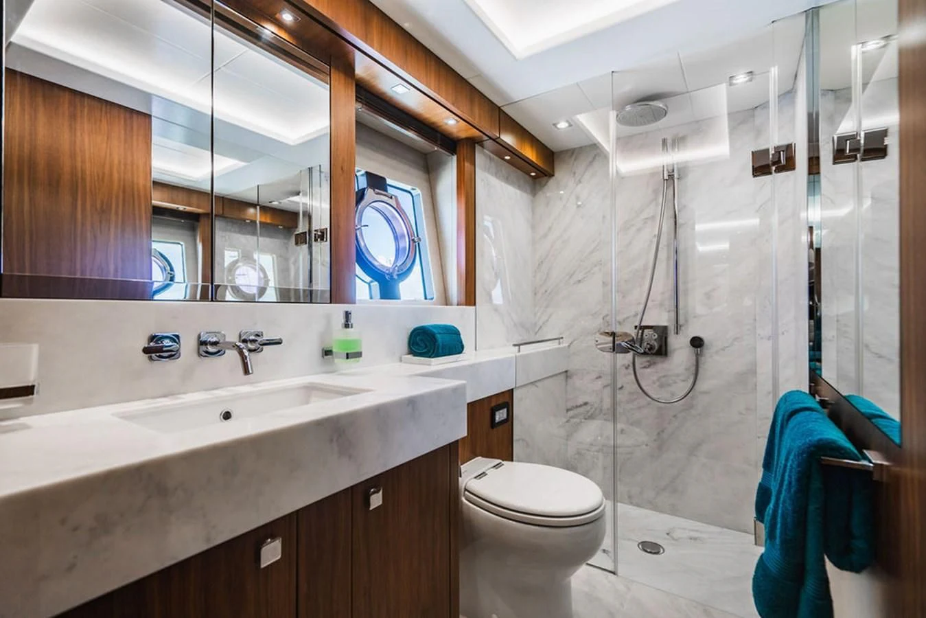 a bathroom with a glass shower aboard SEA-ZAR Yacht for Sale