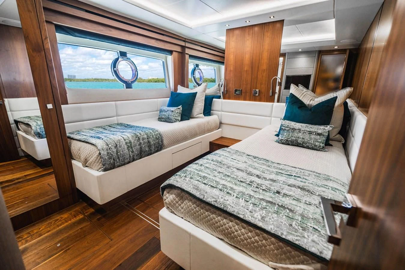 a room with two beds aboard SEA-ZAR Yacht for Sale