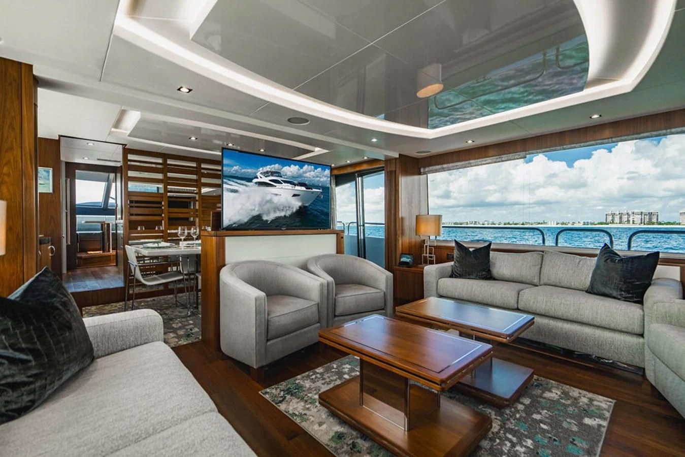 a living room with a large window aboard SEA-ZAR Yacht for Sale