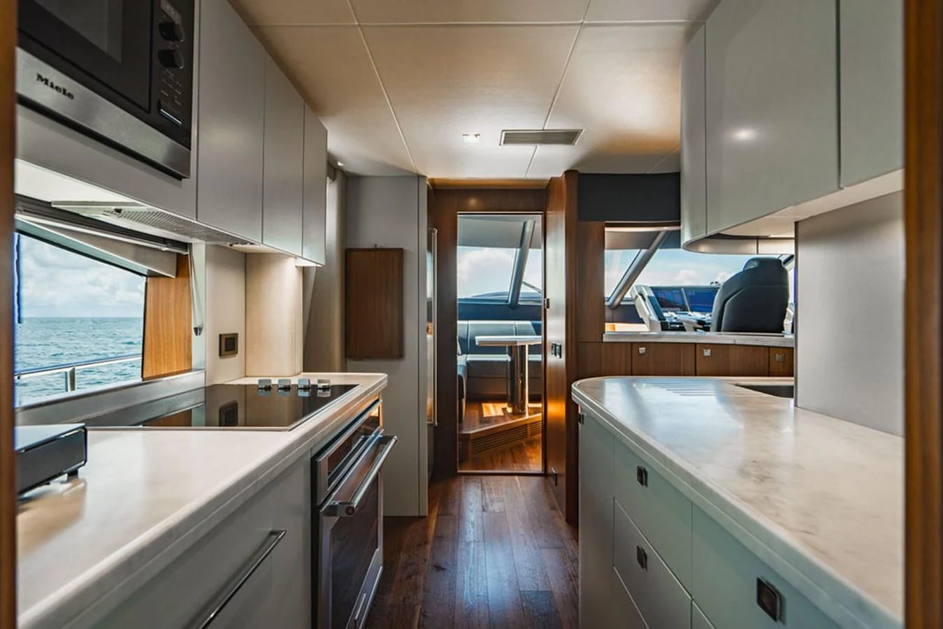 a kitchen with a large island aboard SEA-ZAR Yacht for Sale