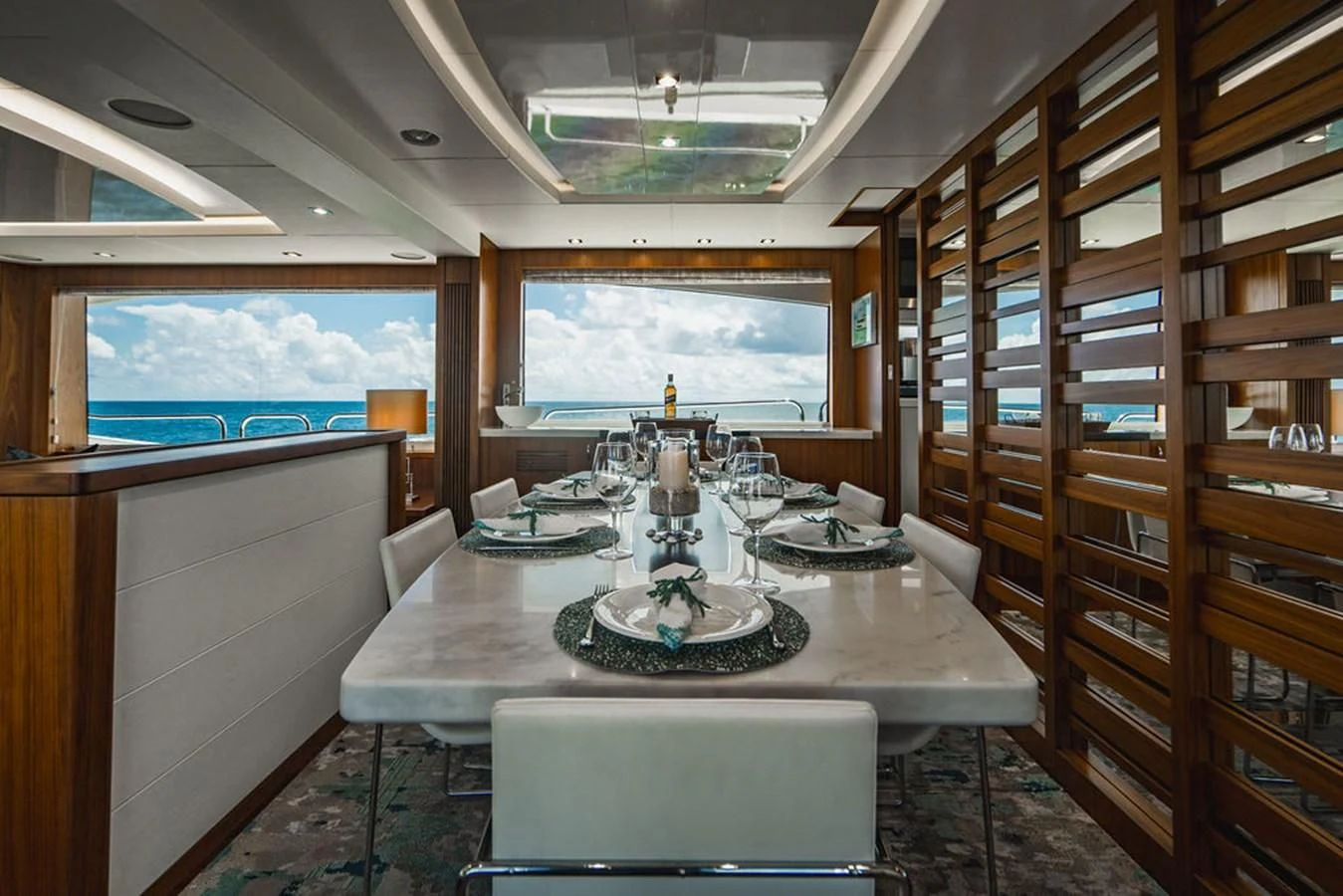a dining table in a room aboard SEA-ZAR Yacht for Sale