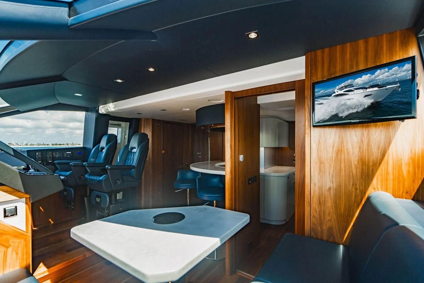 inside of a building with tables and chairs aboard SEA-ZAR Yacht for Sale