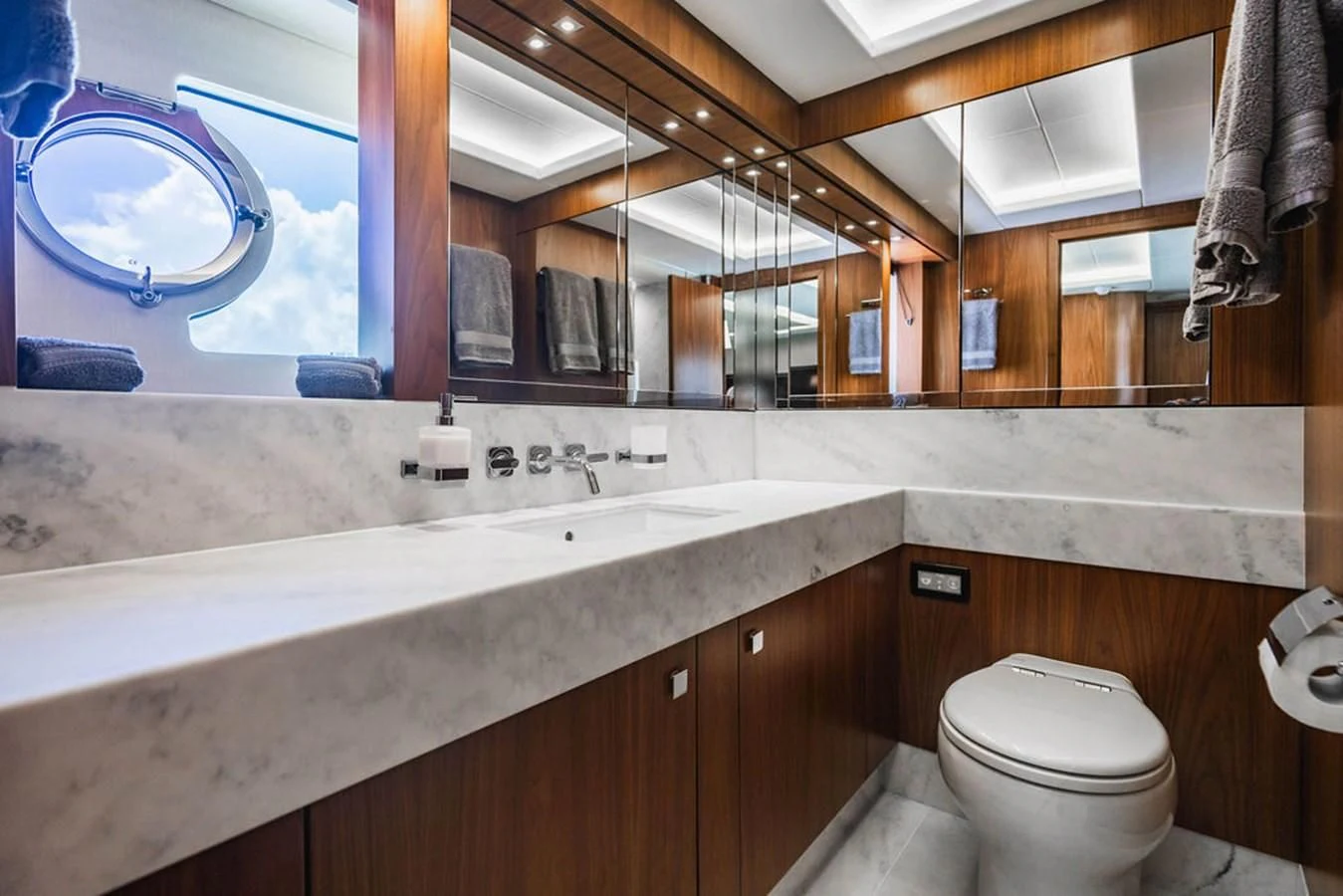 a bathroom with a large window aboard SEA-ZAR Yacht for Sale