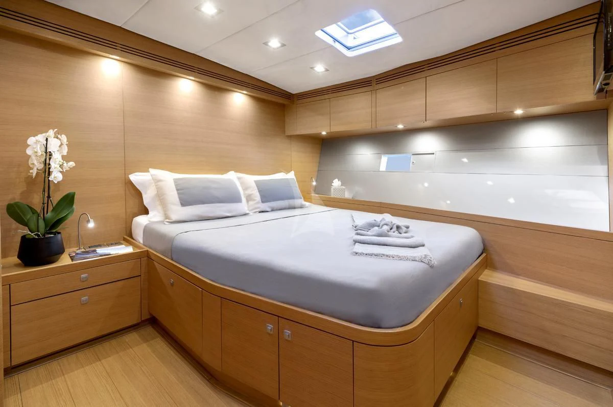a bed in a room aboard BLACK LION Yacht for Sale
