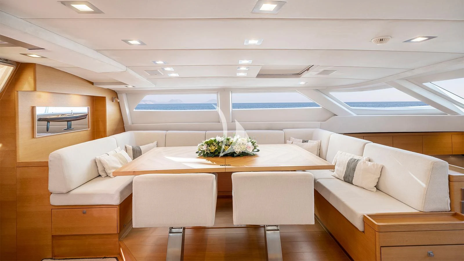 a room with couches and a table aboard BLACK LION Yacht for Sale