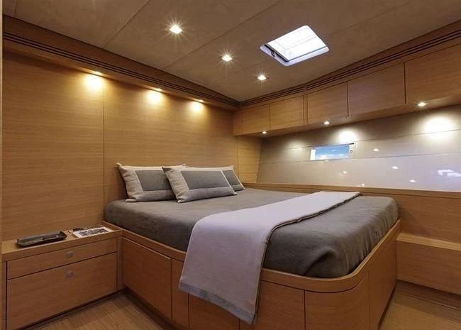 a bed in a room aboard BLACK LION Yacht for Sale