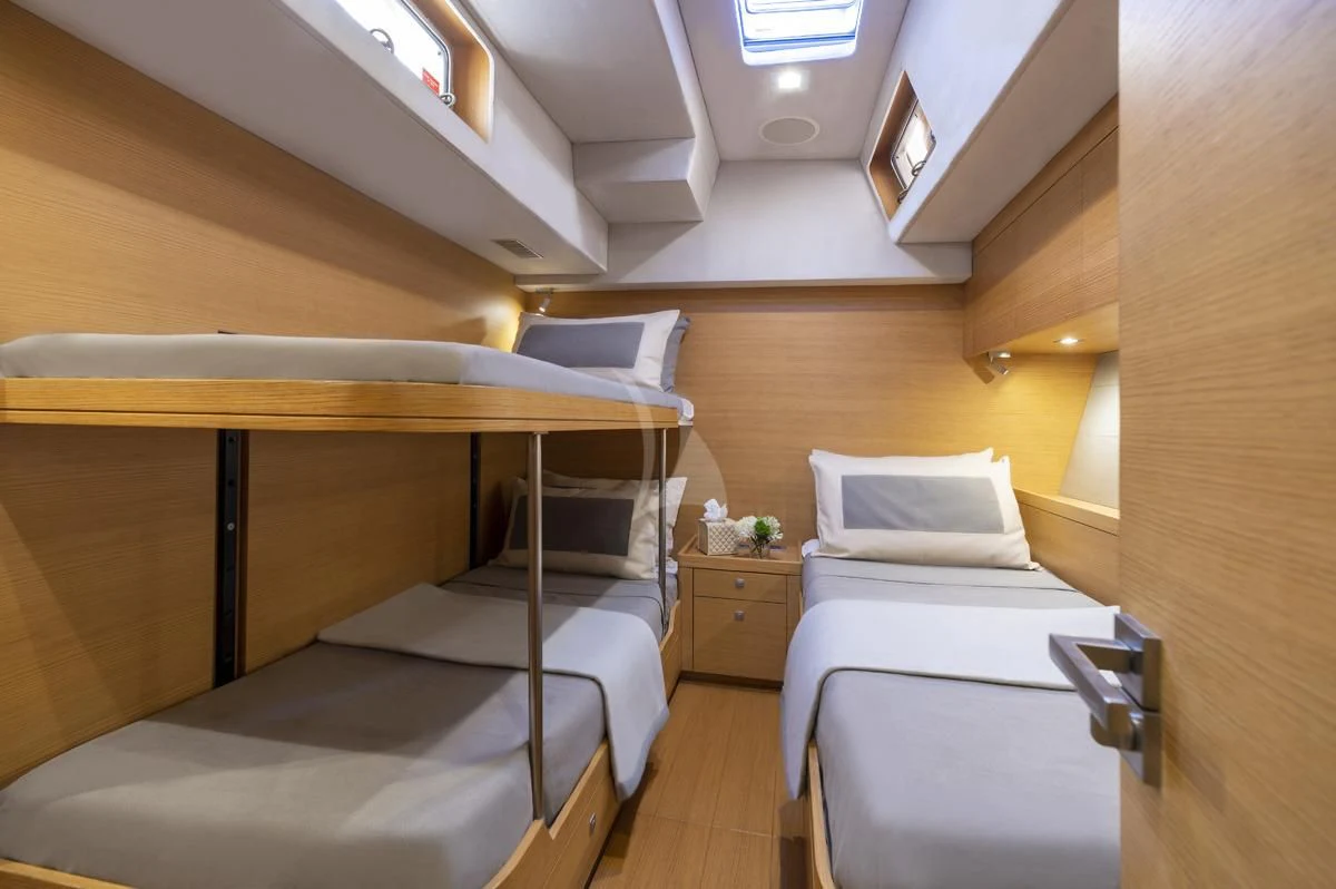 a room with bunk beds aboard BLACK LION Yacht for Sale