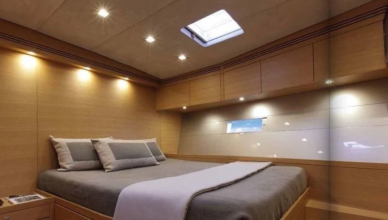 a bed in a room aboard BLACK LION Yacht for Sale