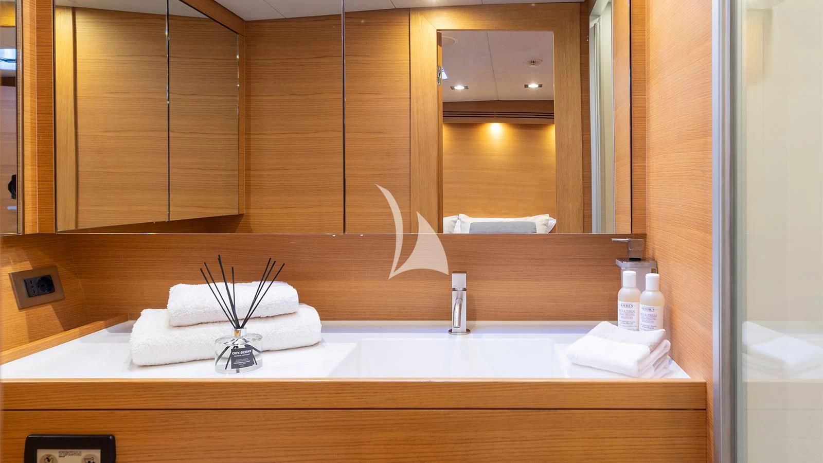 a bathroom sink with towels aboard BLACK LION Yacht for Sale