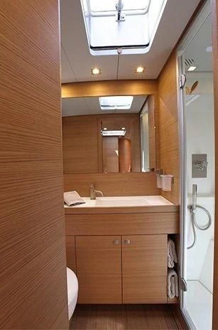 a bathroom with a sink and a mirror aboard BLACK LION Yacht for Sale