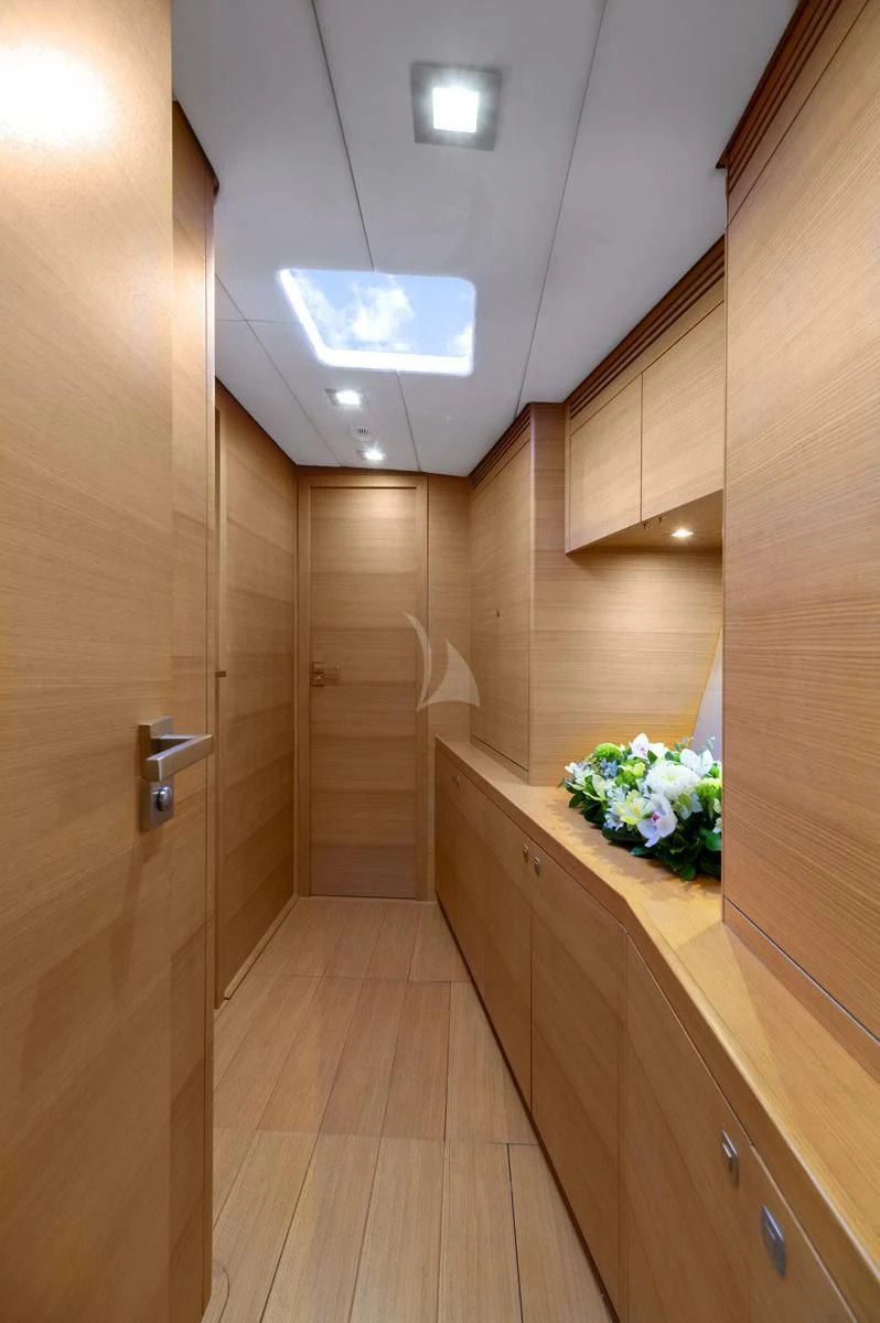 a wood cabinet in a room aboard BLACK LION Yacht for Sale