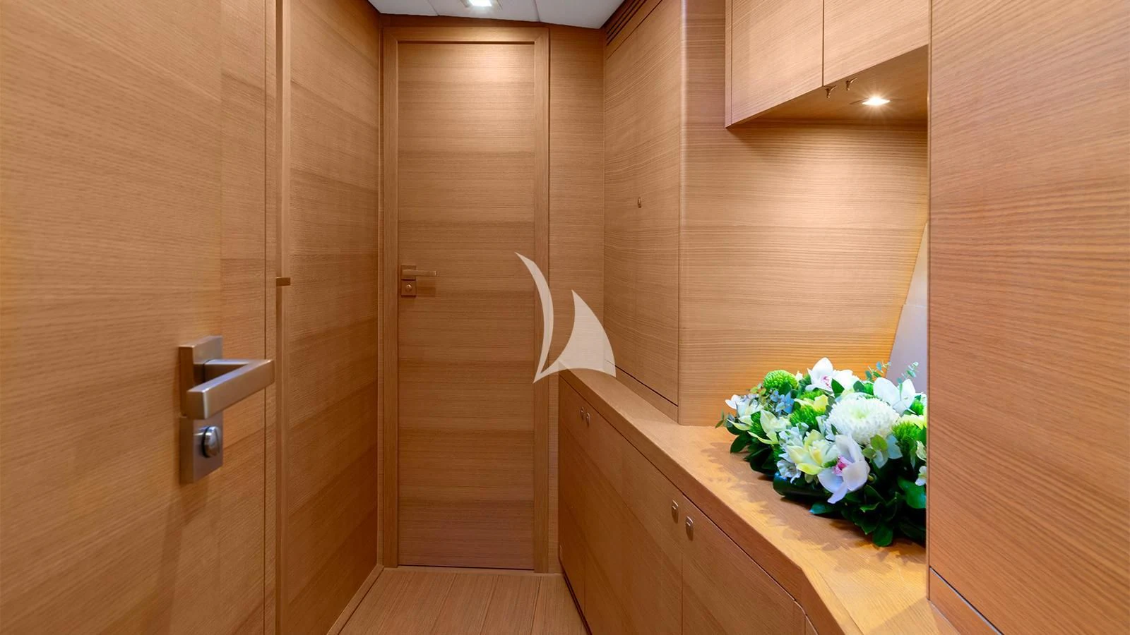 a wooden door with a flower pot on it aboard BLACK LION Yacht for Sale