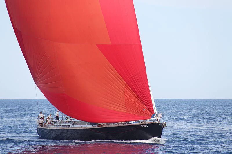 a boat with a large sail aboard BLACK LION Yacht for Sale