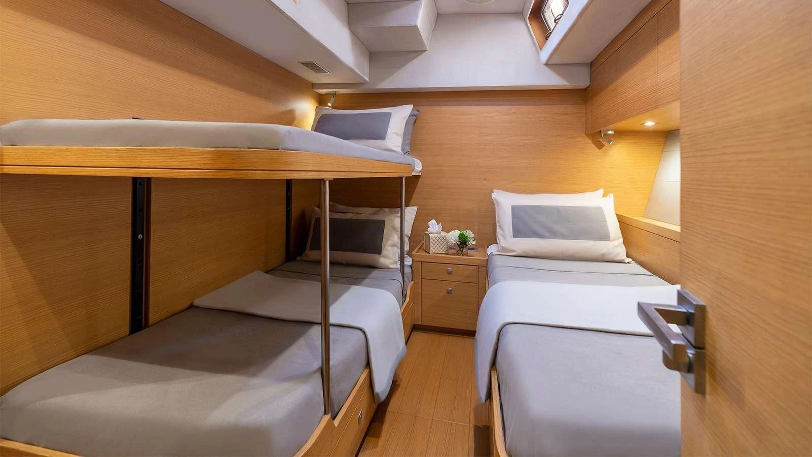 a room with two beds aboard BLACK LION Yacht for Sale