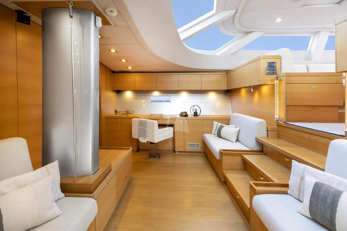 a room with couches and a table aboard BLACK LION Yacht for Sale