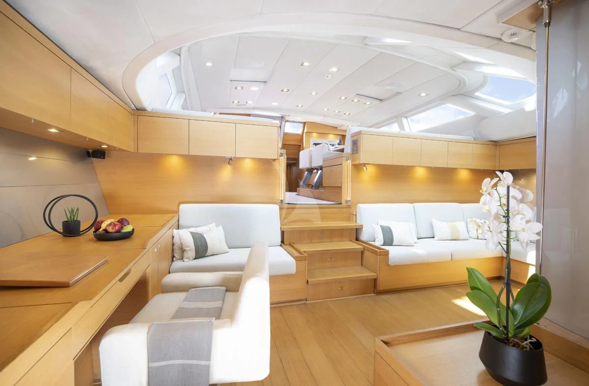 a room with a couch and a table aboard BLACK LION Yacht for Sale