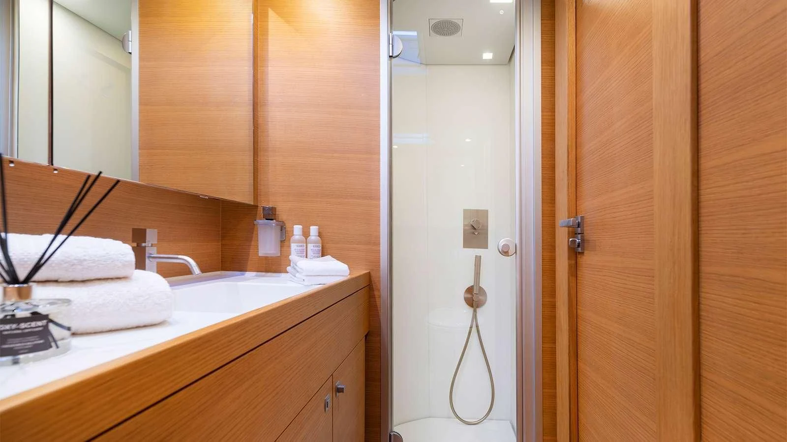 a bathroom with a sink and a mirror aboard BLACK LION Yacht for Sale