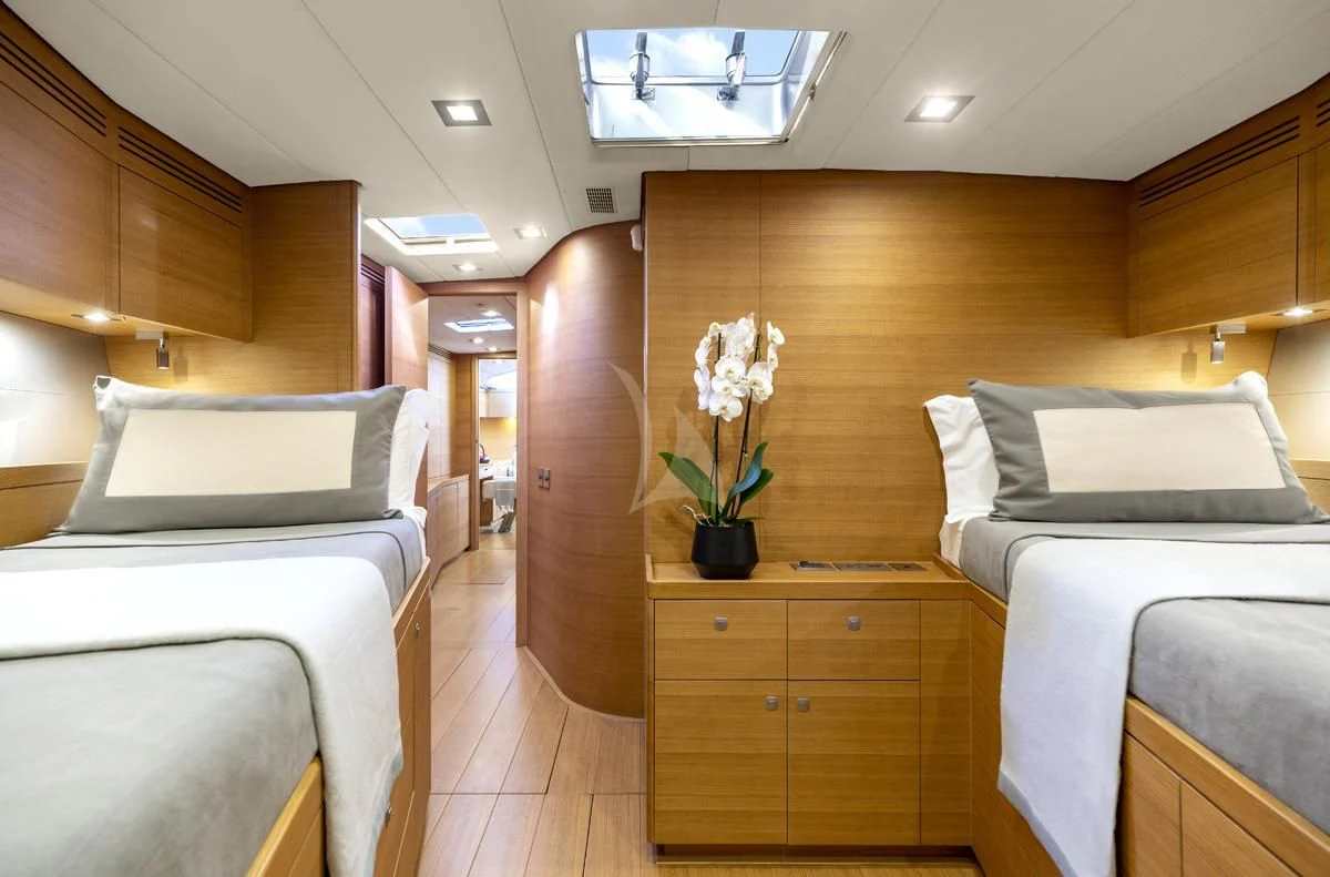 a room with a bed and a desk aboard BLACK LION Yacht for Sale