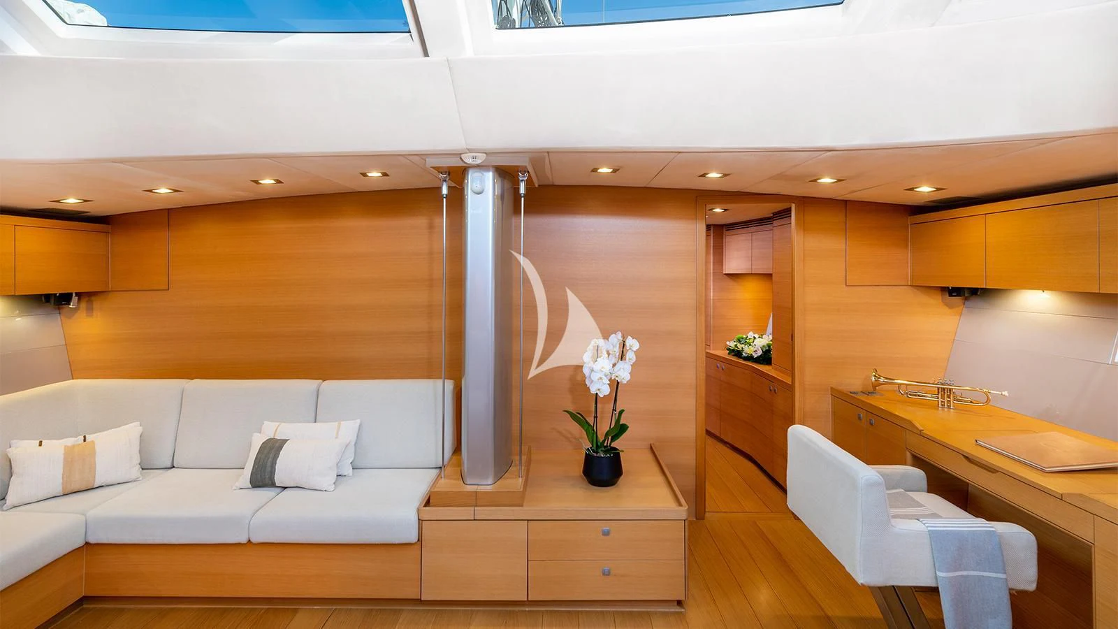 a room with a couch and a table aboard BLACK LION Yacht for Sale